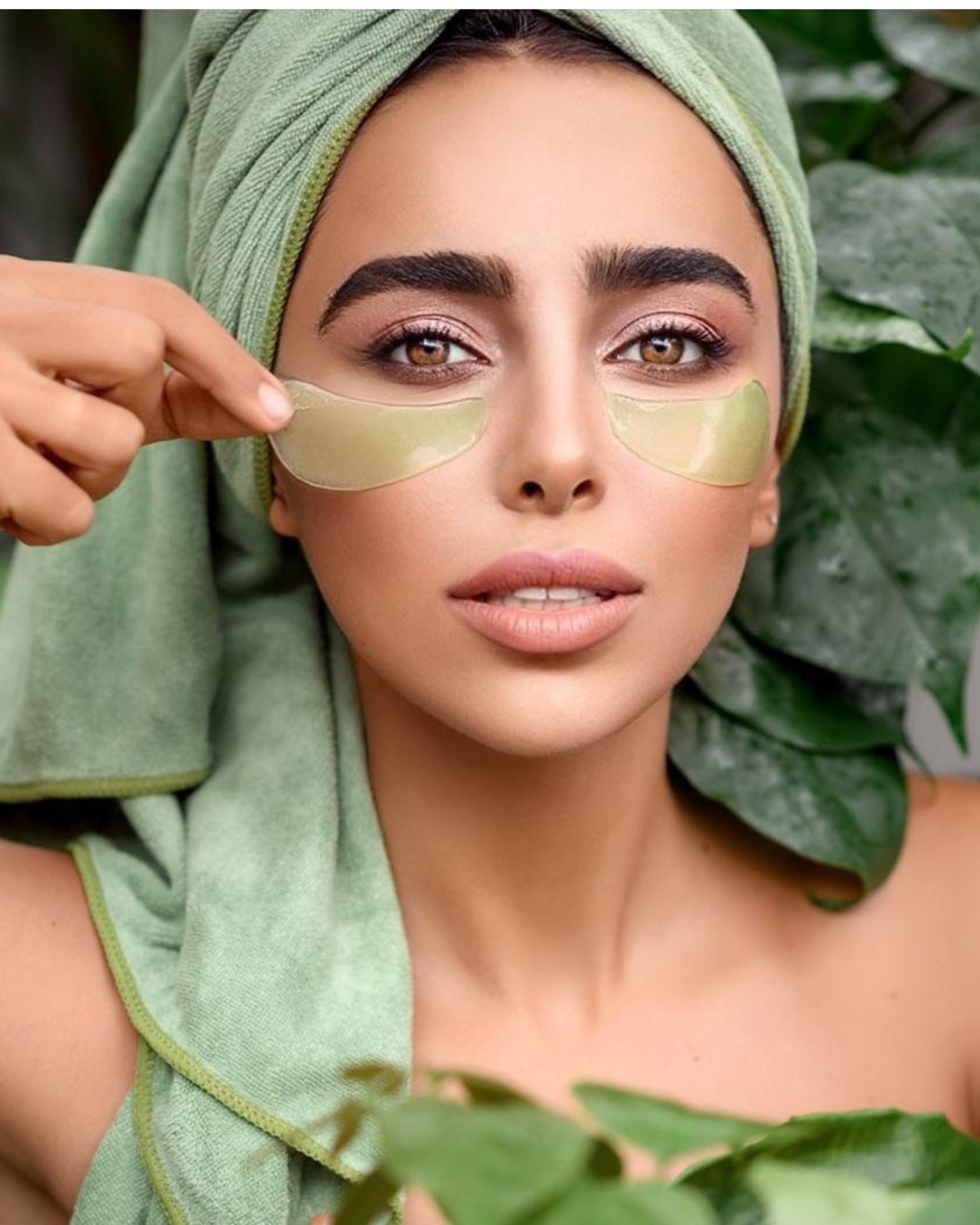 Commercial skincare campaign portrait with under-eye treatment patches